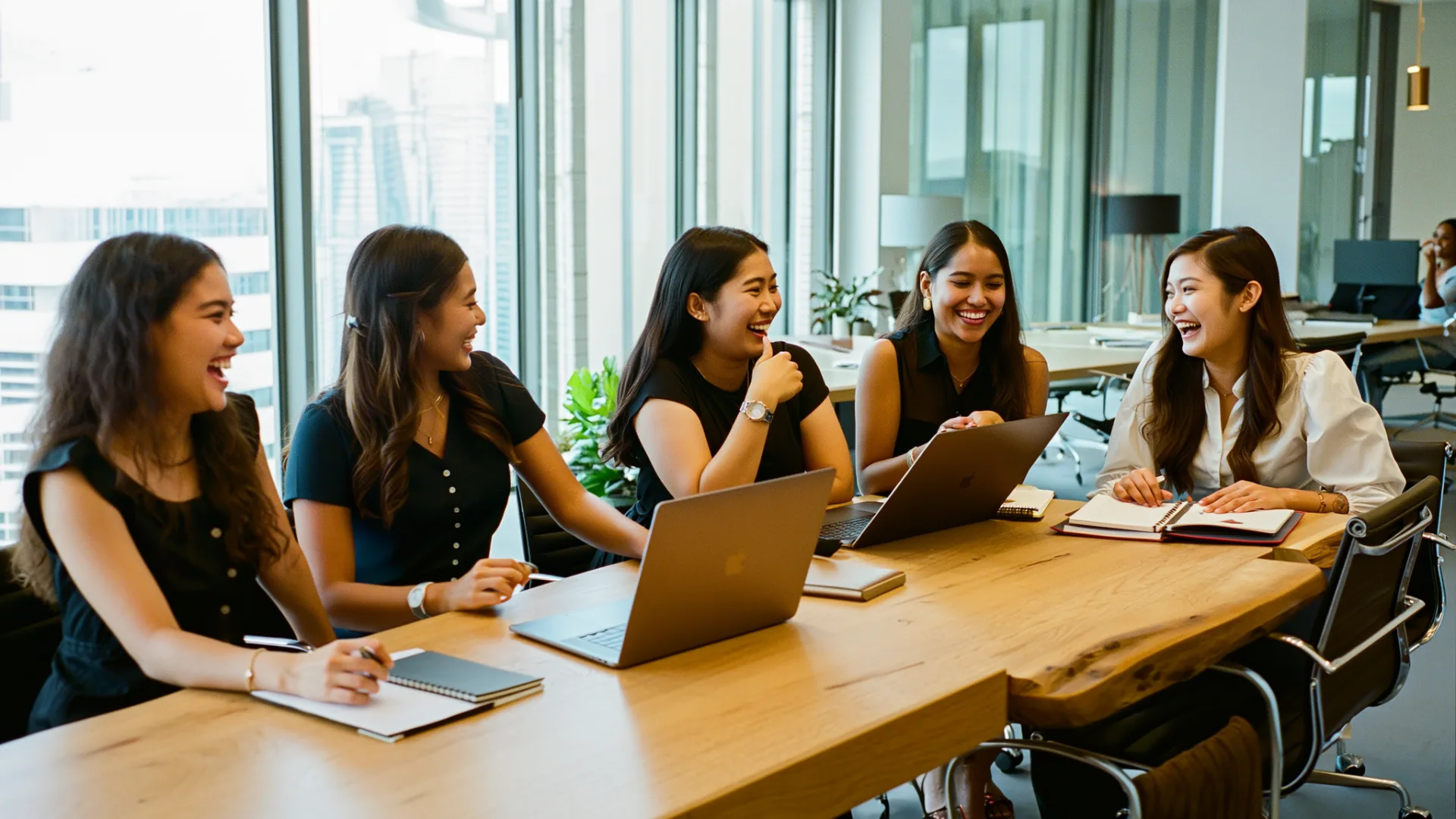 A FINternship cohort collaborating around a table